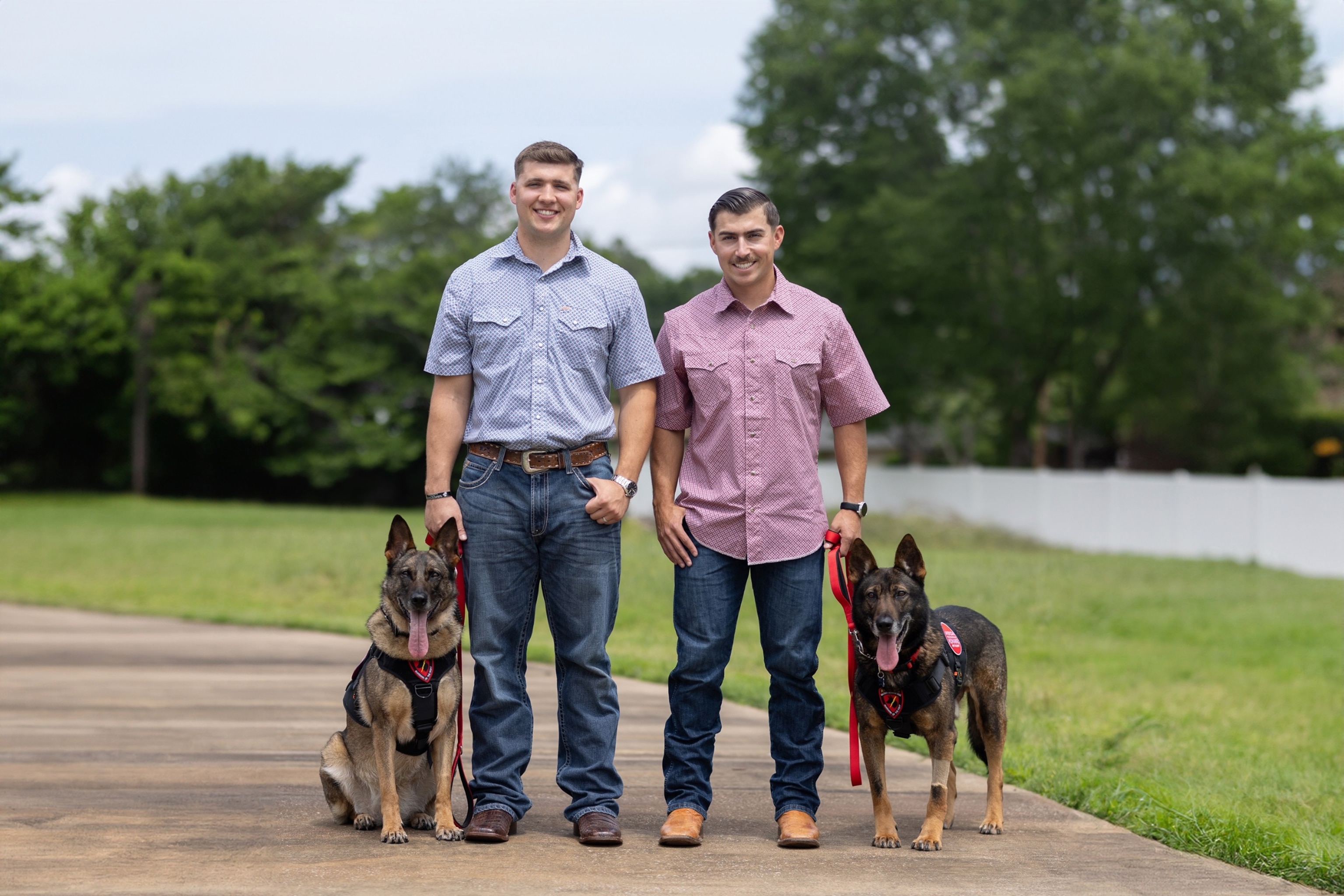 PHOTO: U.S. Marine Corps Sgt. Isaac Weissend and Marine Corps veteran Dalton Stone were reunited with the military dogs they handled while serving in Japan.