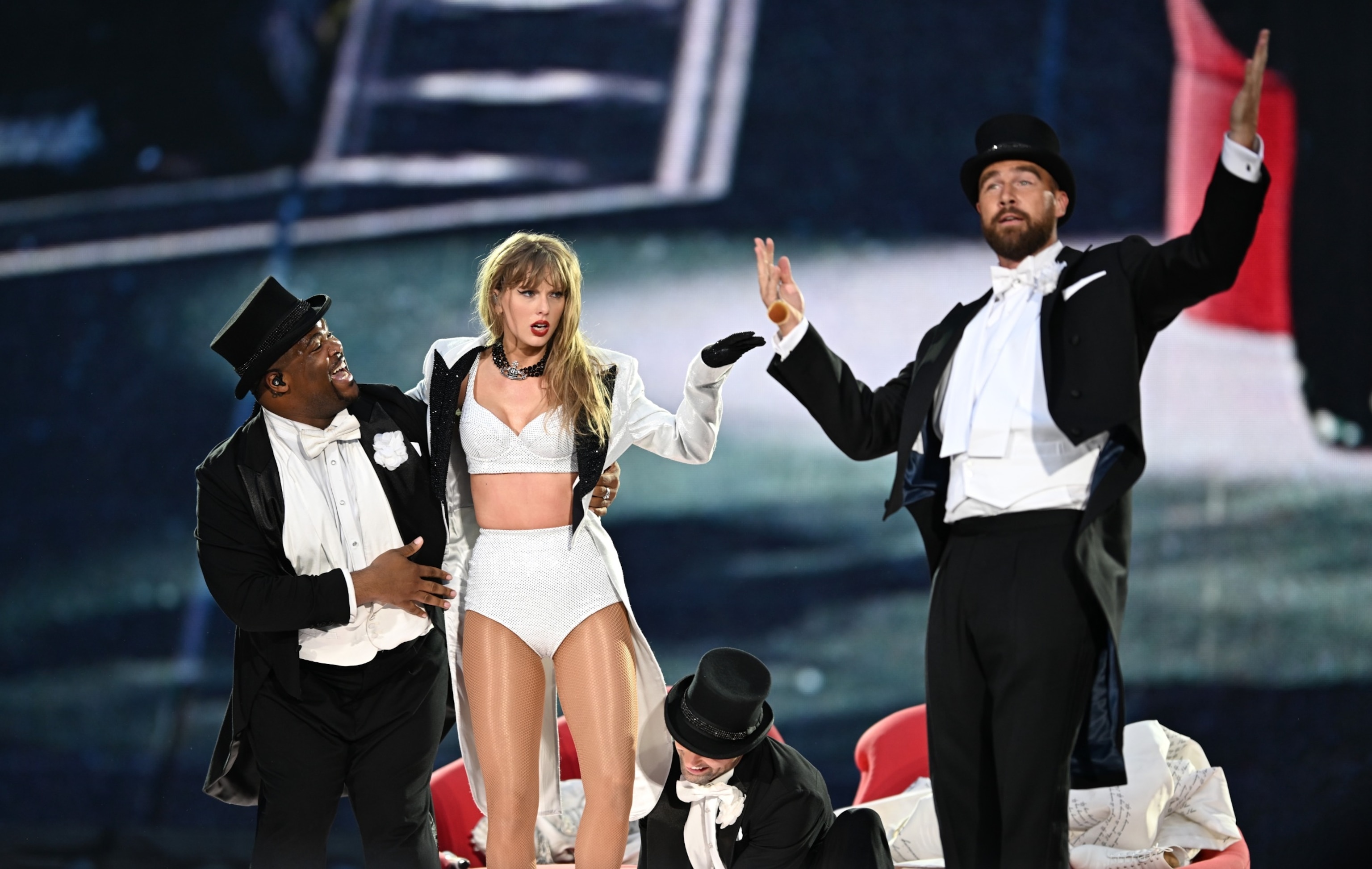 PHOTO: Taylor Swift is joined on stage by Travis Kelce (R), during "Taylor Swift | The Eras Tour" at Wembley Stadium, June 23, 2024, in London.