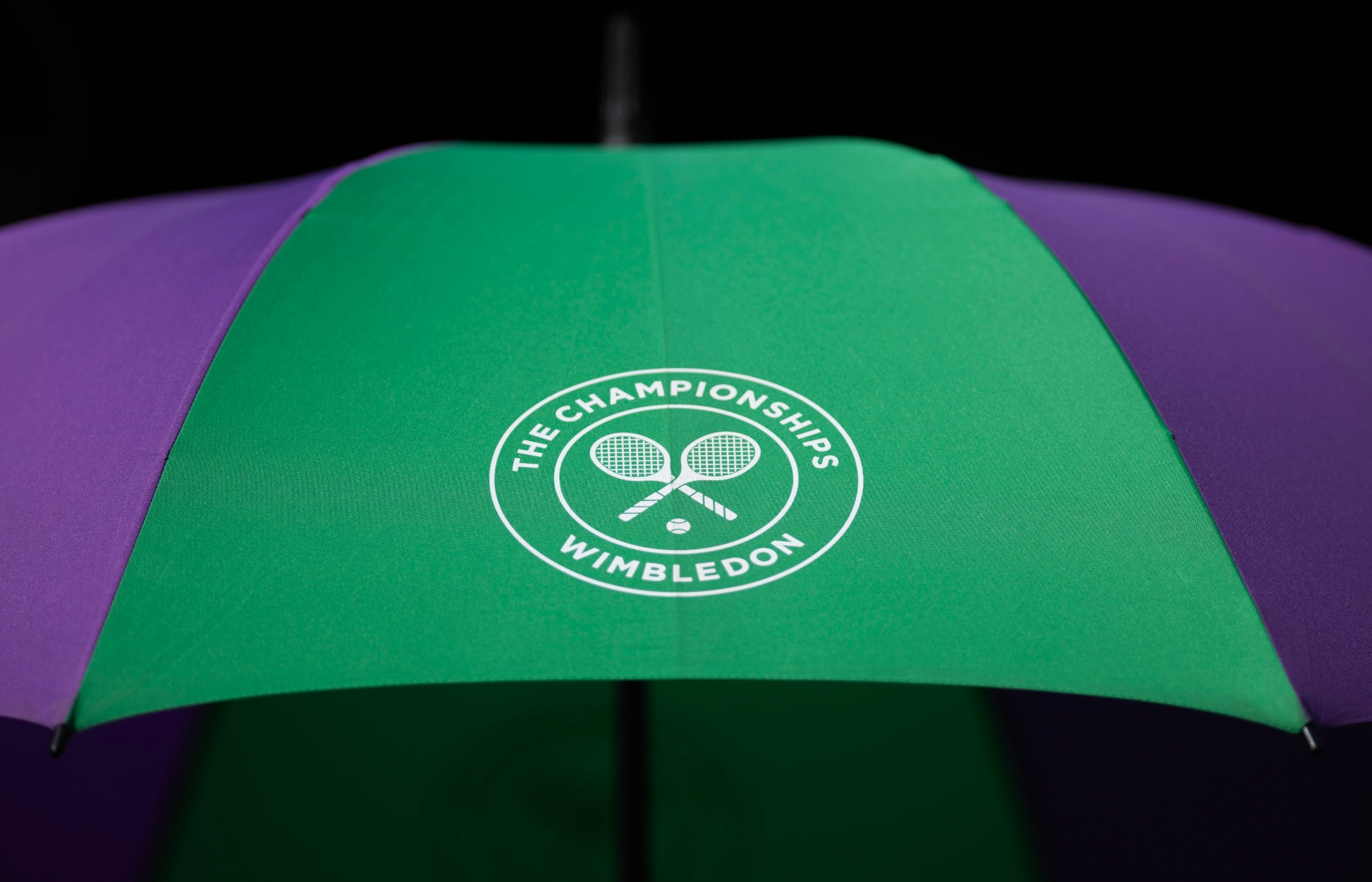 PHOTO: The AELTC logo on an umbrella during day four of The Championships Wimbledon 2023 at All England Lawn Tennis and Croquet Club on July 6, 2023 in London.